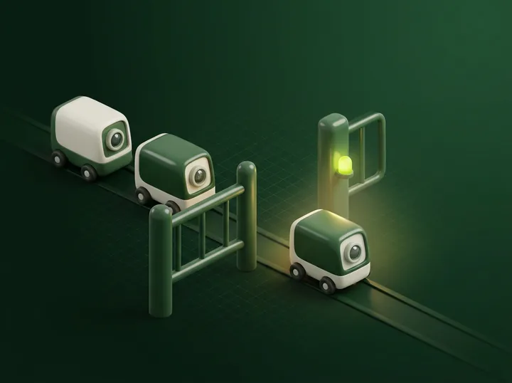 A gate with a sliding bar: one small pod rolls through the open side while another is stopped.